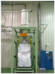 Bulk Bag Filler located under pneumatic receiver - loading carbon black dust from dust collectors. Bulk Bag Filler located under pneumatic receiver - loading carbon black dust from dust collectors.