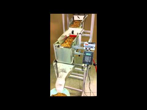 Granola Filling Machine: Logical Machines Model S-6 running 9 oz chunky granola