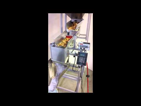 Logical Machines Model S-6 running 3.2 oz Chicken Jerky