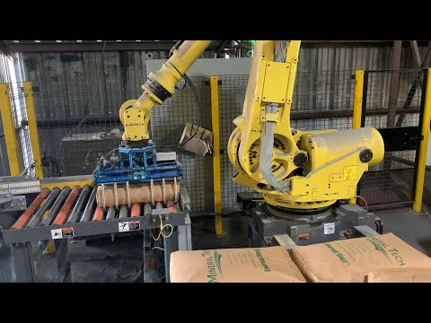 Robotic Arm Palletizer Stacks 100 Lb. Bags