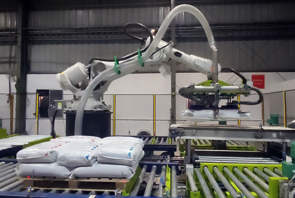 robotic depalletizer and bag opening system for chemical powders