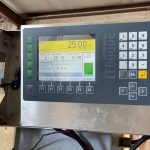 IT6000E batchweighing controller attached to bagging machine set target weight 25 lbs