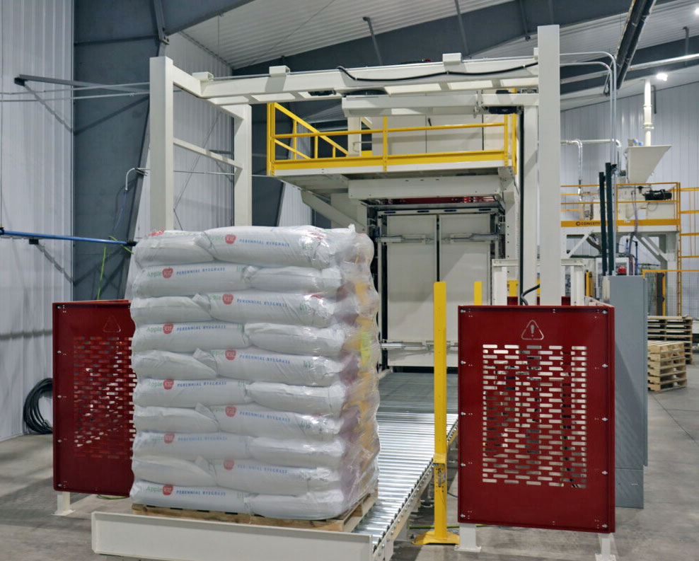 high speed gantry palletizer system with wrapped pallet of 50 lb bags
