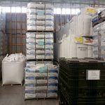 016-final-stacked-pallets-of-bags-of-seed-and-feed