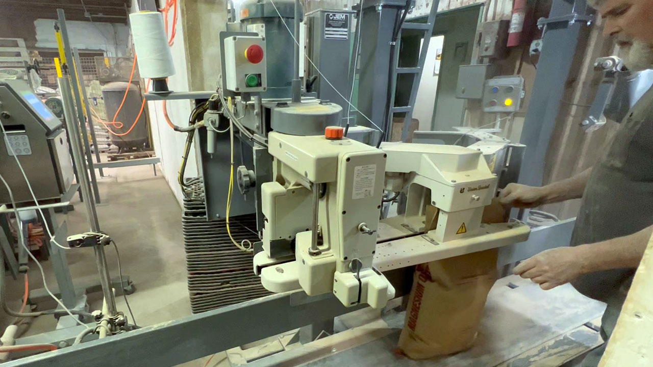 Video of Feed Sack Sewing Machine in Bagging System