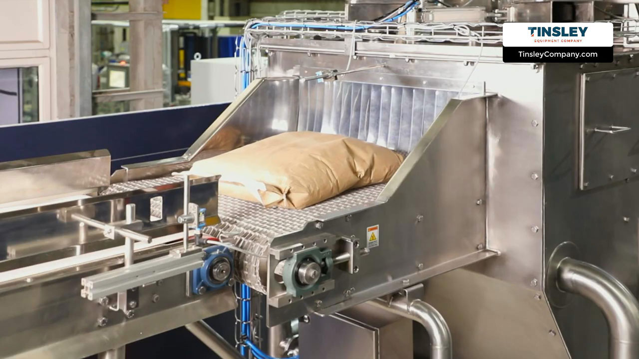 Multiwall paper bags entering the automatic bag opener