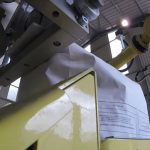 fanuc robotic valve bag placer view of bag filling and empty bag placing