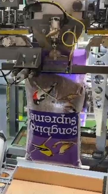 open mouth bag placer - bird seed