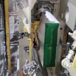 valve bag on spout of automatic valve bag filling machine