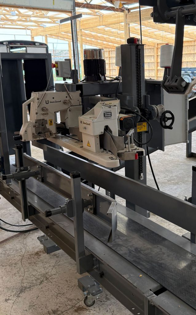 Union Special Bag Sewing Machine and Pedestal with Powered Bag Infeed