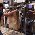 Filling 50 lb Bags with Corn and Wheat Flour using an Auger Filler