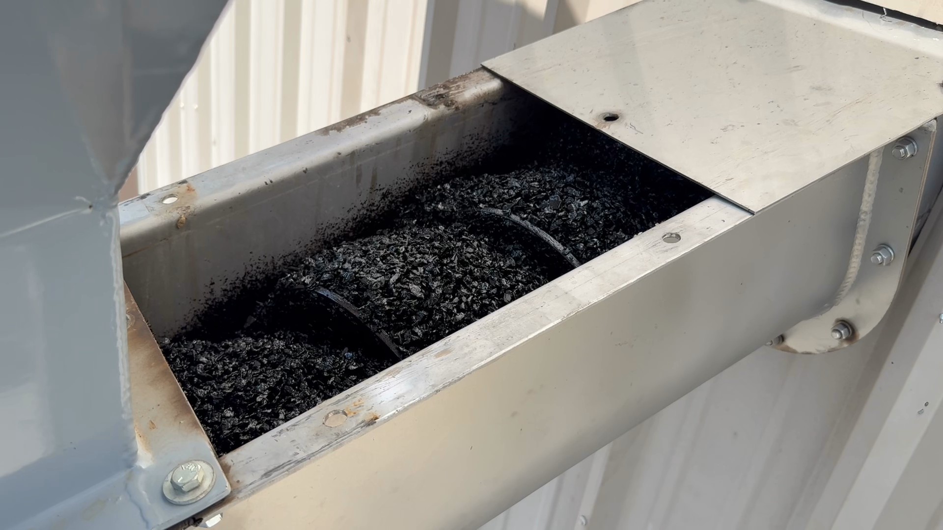 sticky asphalt cold patch in auger