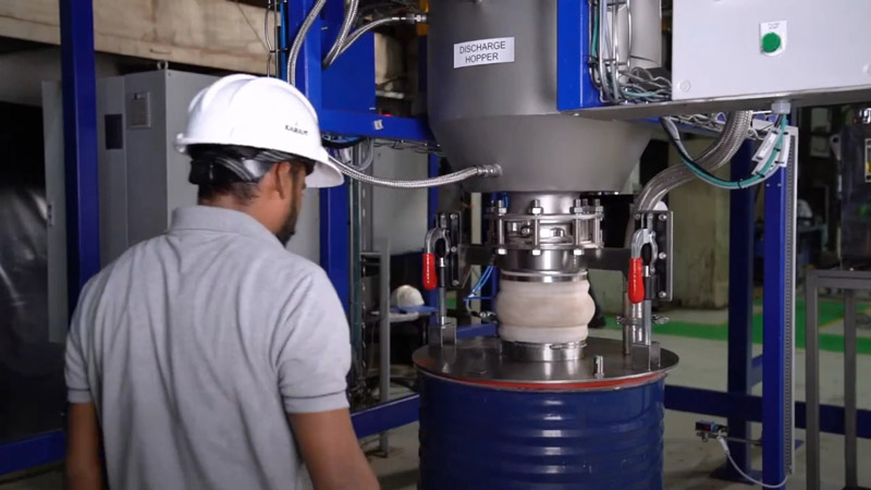 sealed drum collection and weighing of processed rare earth material