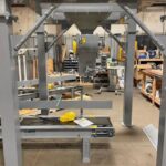 mechanical bagging scale attached to probox seed box stand