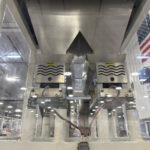 stainless-steel-hopper-under-pneumatic-conveyor-and-above-duplex-net-weigh-scale