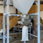 used 25 cubic foot hopper over digital open mouth bagger