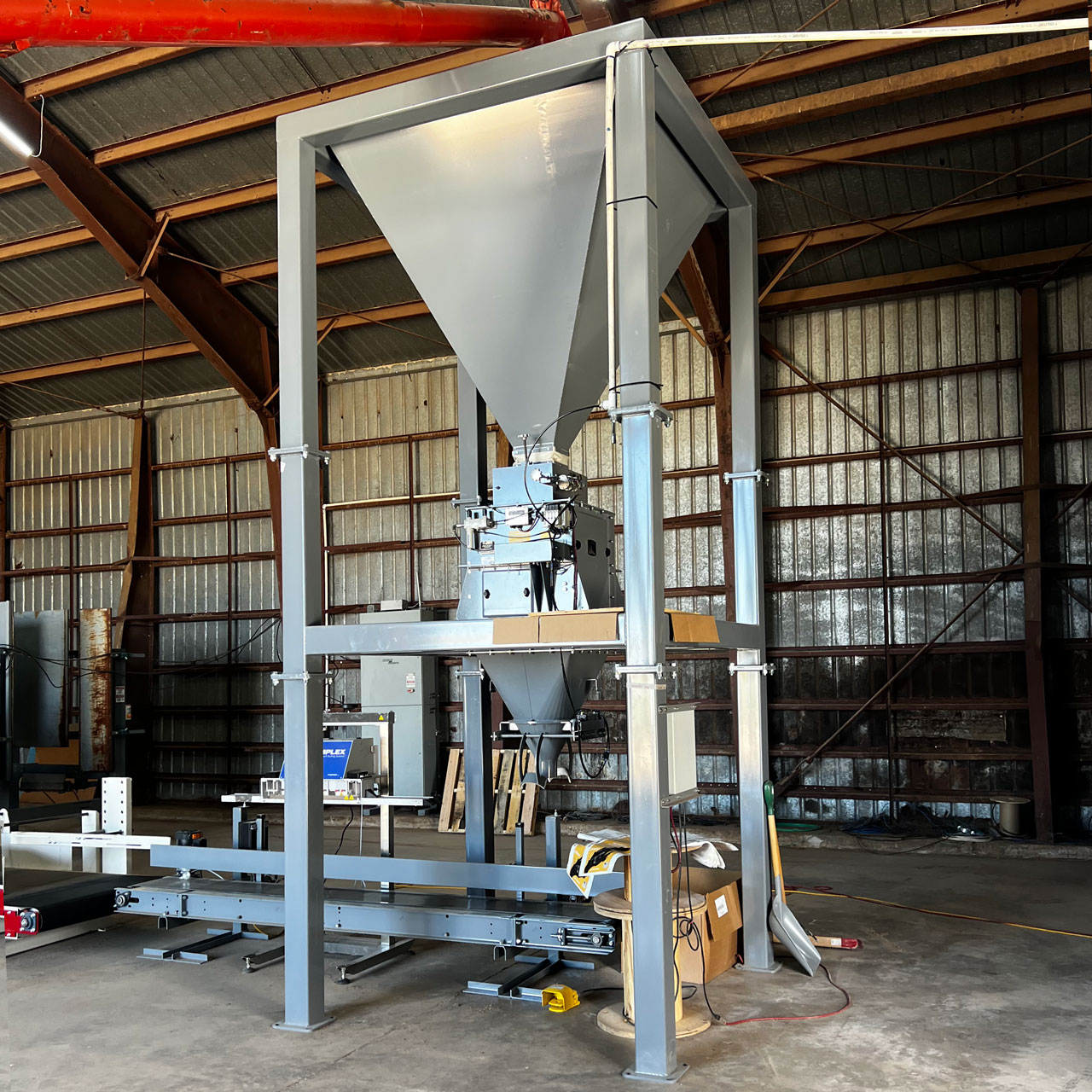 bagging system for granular absorbents